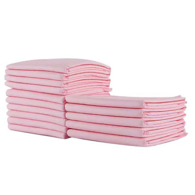 Un tampon de remise en forme d'oreiller jetable avec une couche absorbante 6Ply en blanc.