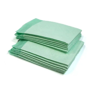 Un tampon de remise en forme d'oreiller jetable avec une couche absorbante 6Ply en blanc.