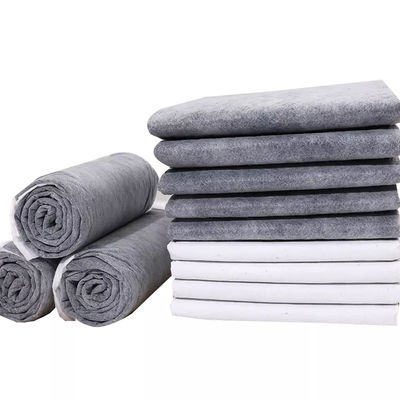 Des coussins d'entraînement jetables pour animaux avec du charbon de bambou super absorbant et un autocollant adhésif
