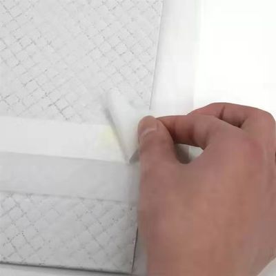Surface sèche et douce respirante pour l'absorption de l'urine