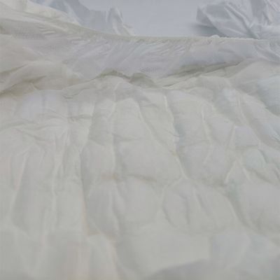 La couche supérieure est douce, maintenant tissée, couche fragile pour adultes, couche ultra-épaisse pour adultes.